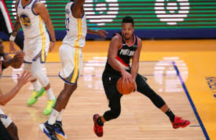 Behind CJ McCollum, Blazers rally past Raptors