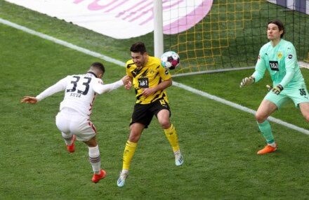 Soccer-Eintracht win at Dortmund to boost Champions League hopes