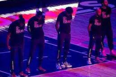 Players hold moment of silence for Black shooting victim ahead of rescheduled game